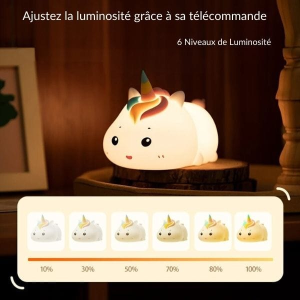 Veilleuse licorne avec lumière douce dans une chambre