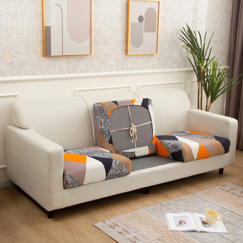 Housse de coussin extensible sur canapé moderne gris