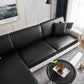 Housse similicuir noire sur coussin de canapé, vue de face