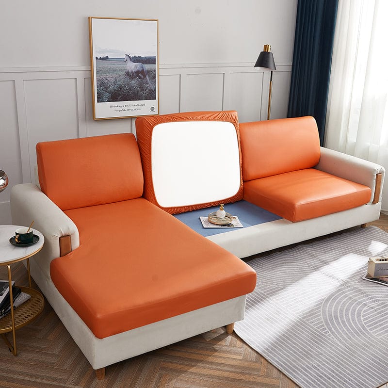 Vue d'ensemble d'un canapé recouvert de simili cuir orange