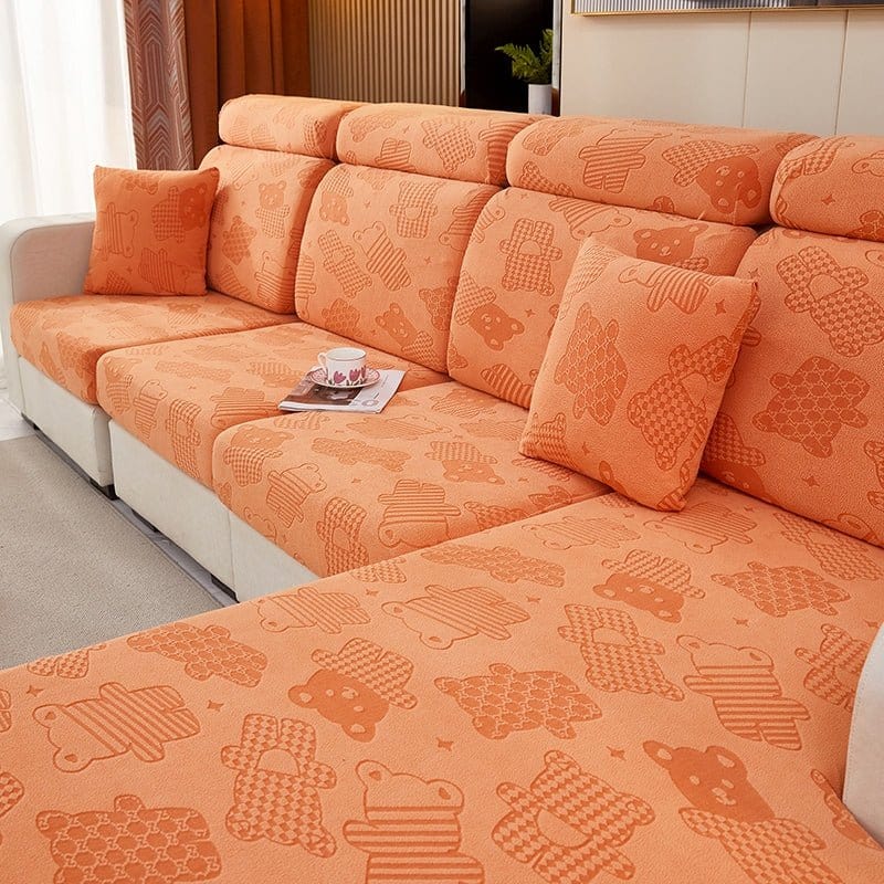 Gros plan sur la texture moelleuse de la housse polaire orange