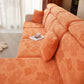 Housse polaire orange ajustée sur un coussin de canapé