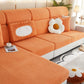 Housse polaire orange ajustée sur un coussin de canapé