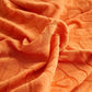 Détail du motif palmier sur housse polaire orange