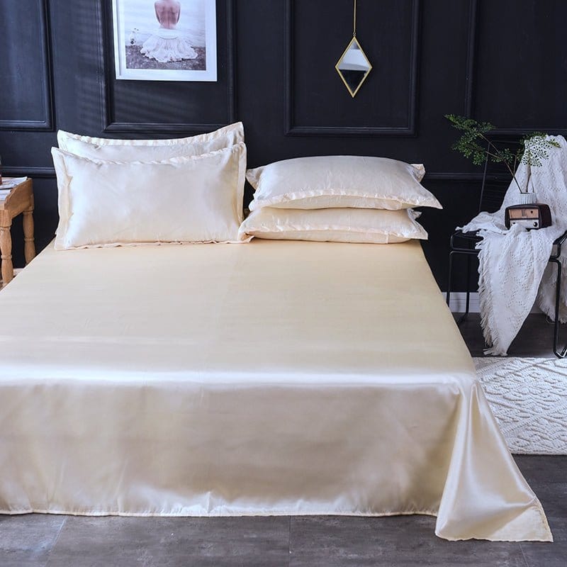 Zoom sur la texture satinée de la housse de couette beige