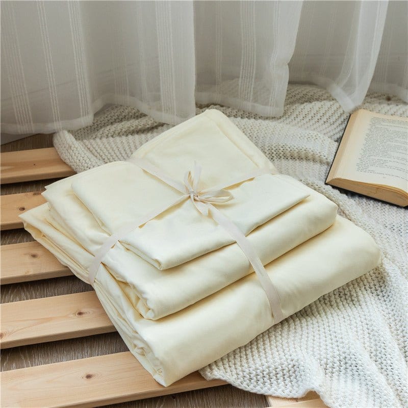 Ensemble de lit blanc cassé avec housse de couette et taies assorties