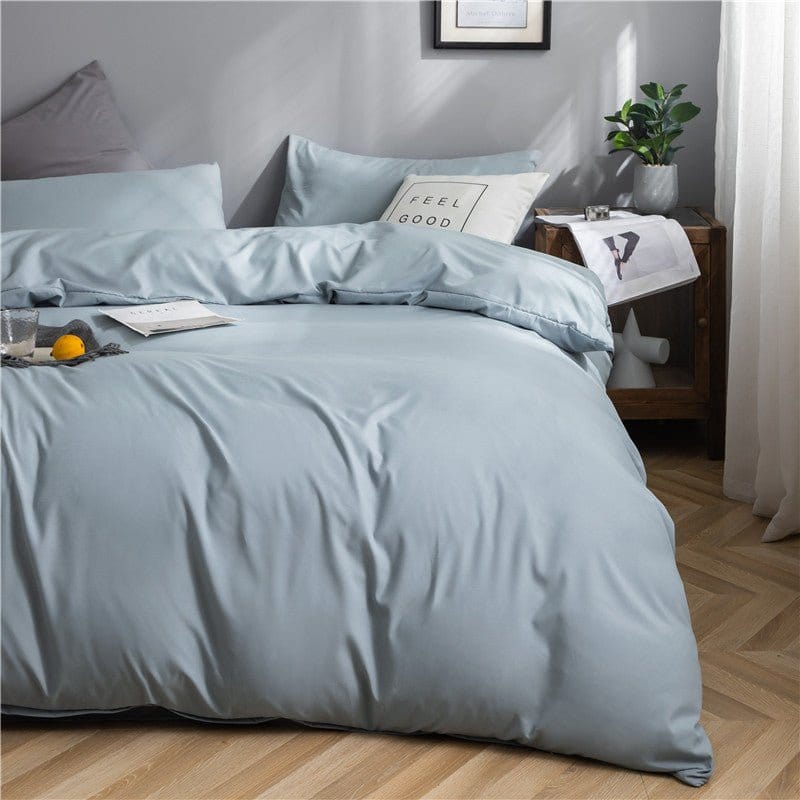 Gros plan sur la texture douce du tissu bleu ciel des draps