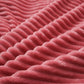 Gros plan sur la taie d'oreiller en velours rose assortie