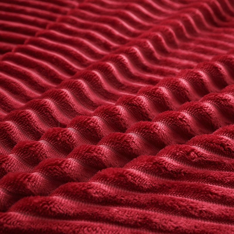 Détail de la fermeture à glissière sur le drap-housse en velours