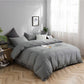 Deux taies d'oreiller assorties en tissu doux gris clair