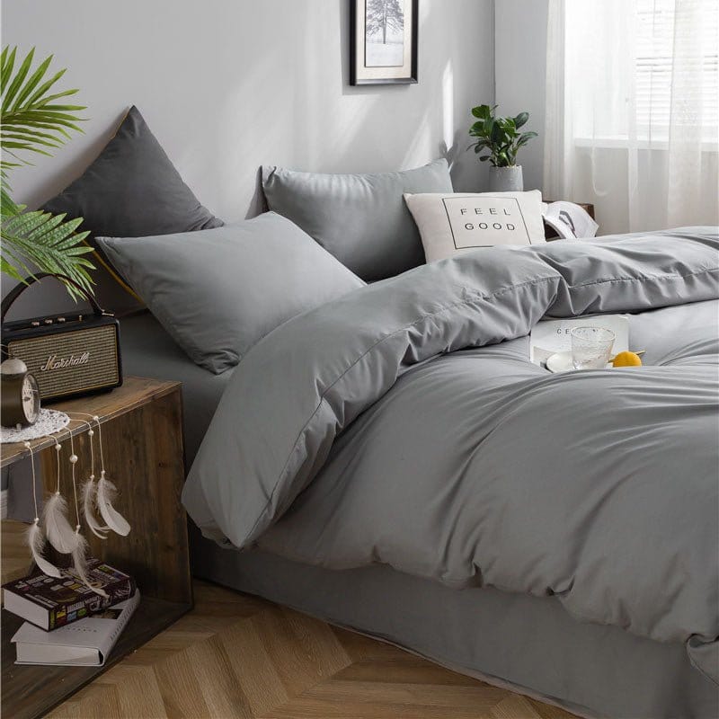 Zoom sur la texture douce et confortable du tissu gris
