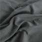 Zoom sur la texture douce du tissu gris de la housse de couette