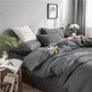 Ensemble de draps gris montrant la coordination des éléments