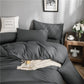 Disposition harmonieuse des draps et taies sur un lit