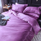 Parure de lit mauve avec drap housse et accessoires assortis