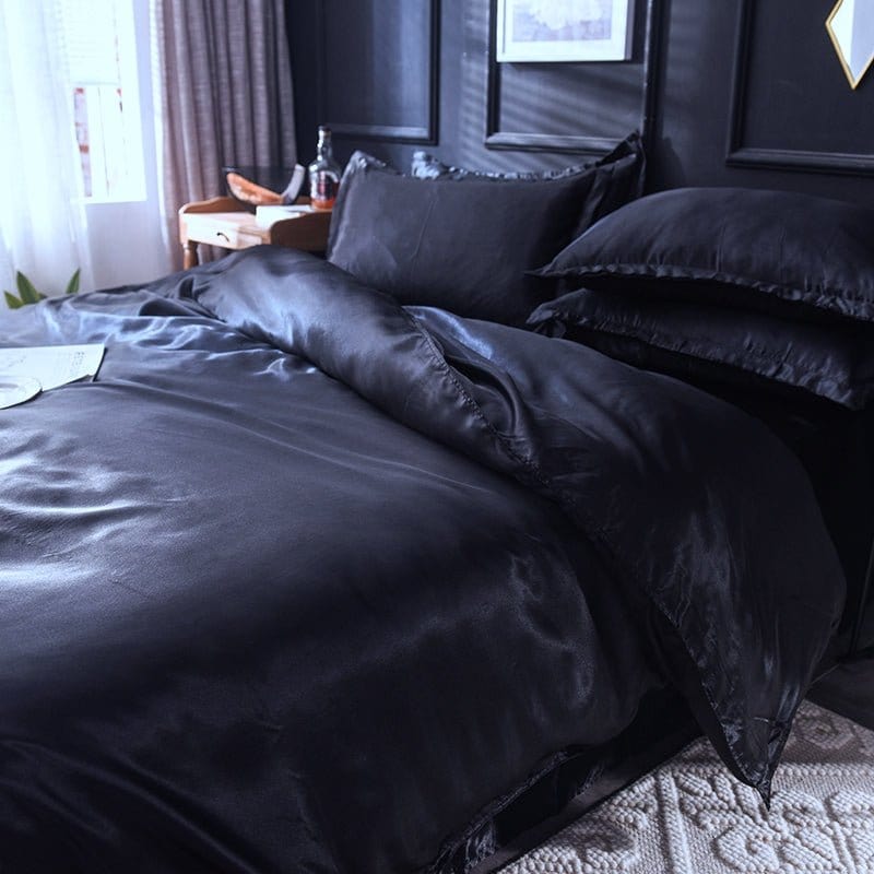 Lit avec parure noire, soulignant le design élégant et uni