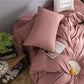 Parure de lit en coton rose pêche, idéale pour une chambre moderne