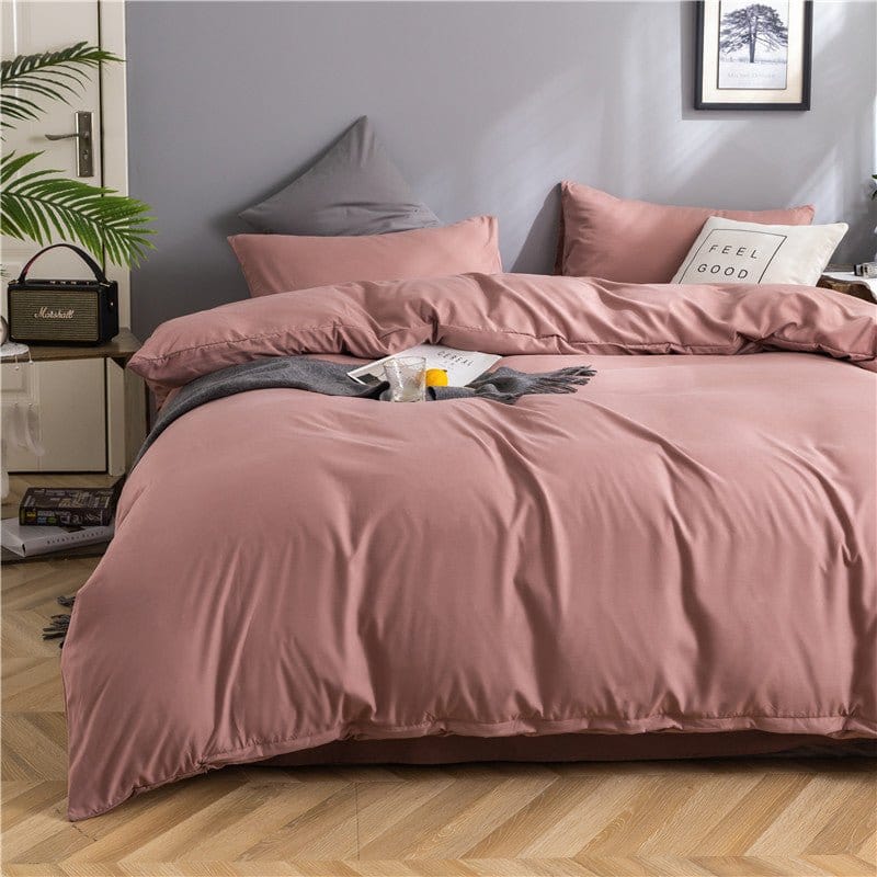 Parure de lit rose pêche, drap housse et housse coordonnés