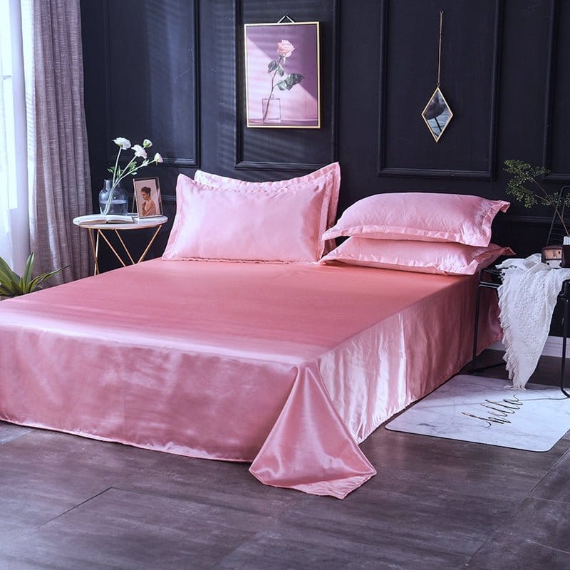Parure de lit rose satinée avec housse de couette et oreillers