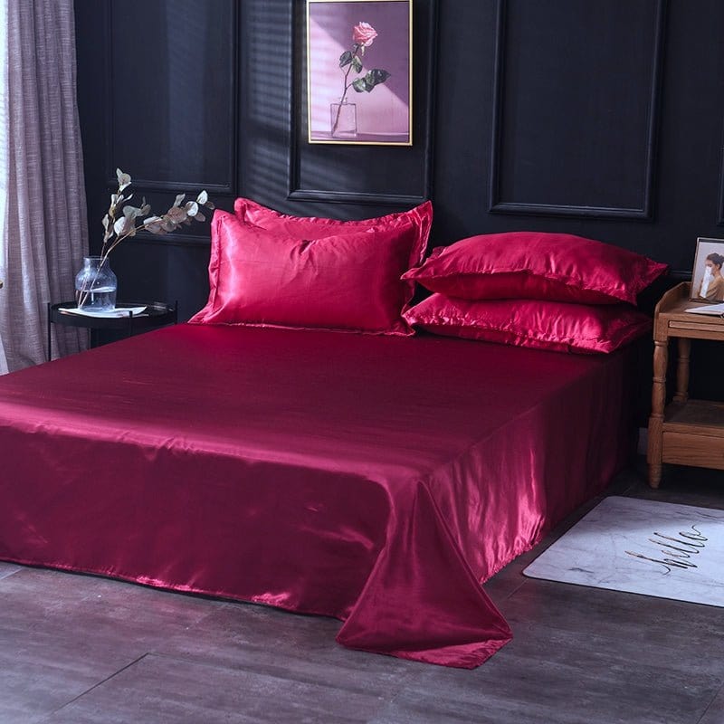 Parure de lit rouge satinée avec housse de couette et oreillers