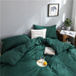 Parure de lit verte en tissu doux, vue d'ensemble de la chambre
