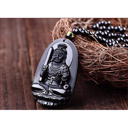 Vue de face du pendentif Bouddha en obsidienne noire