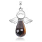 Pendentif ange, reflet lumineux sur la surface