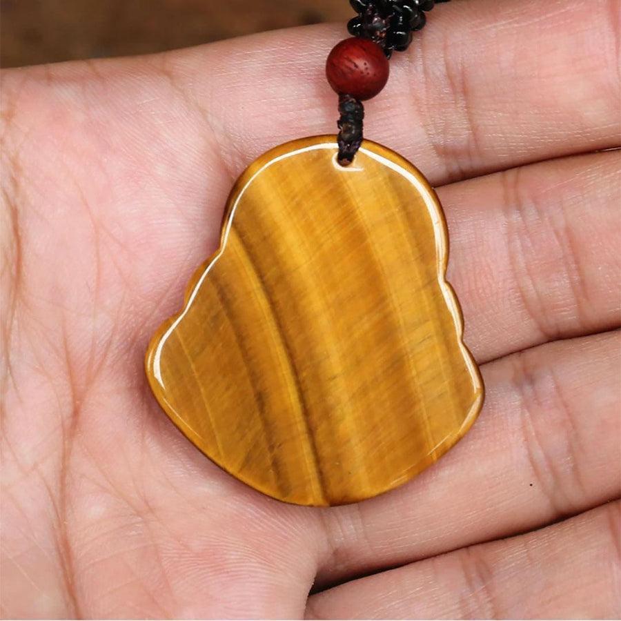 Détail du pendentif Bouddha en pierre Œil de tigre
