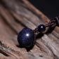 Pendentif en gré bleu avec corde tissée
