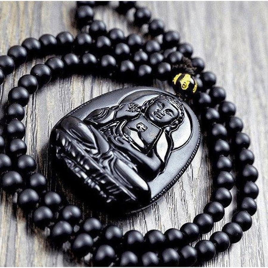 Collier de perles noires avec pendentif Bouddha