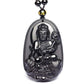 Vue latérale d'un pendentif Bouddha en obsidienne