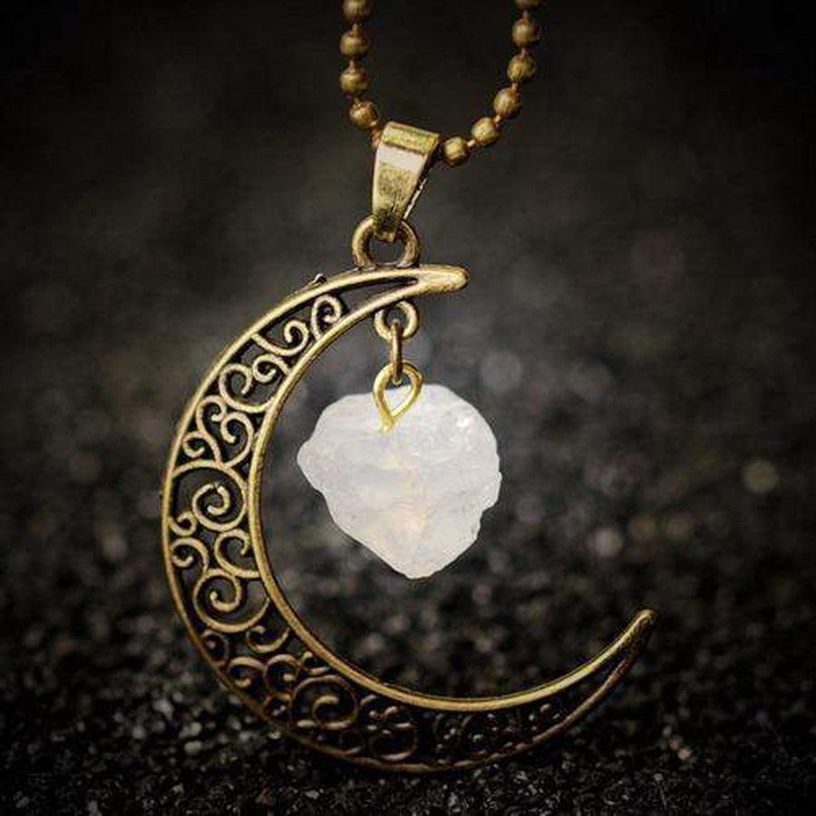 Pendentif demi-lune en quartz vert sur fond neutre