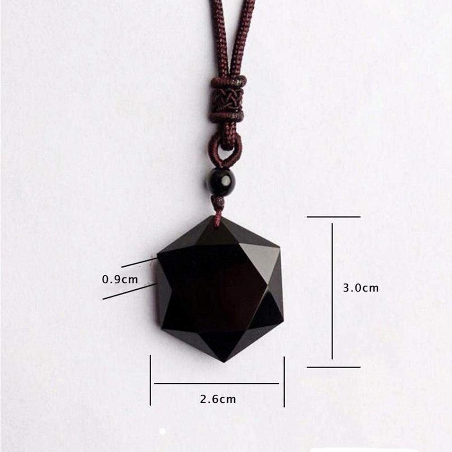 Vue latérale du pendentif étoile en obsidienne noire
