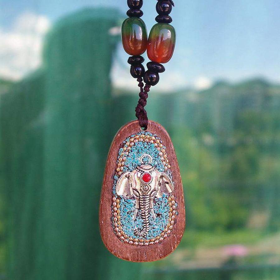 Pendentif Ganesh sculpté en bois précieux, vue de face