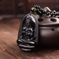 Vue latérale du pendentif en obsidienne noire