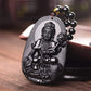 Amulette obsidienne polie avec Bouddha en relief