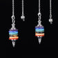 Pendule complet illustrant les sept chakras alignés