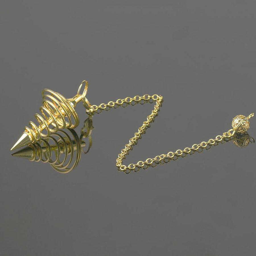 Pendule argenté en spirale, vue latérale sur fond neutre