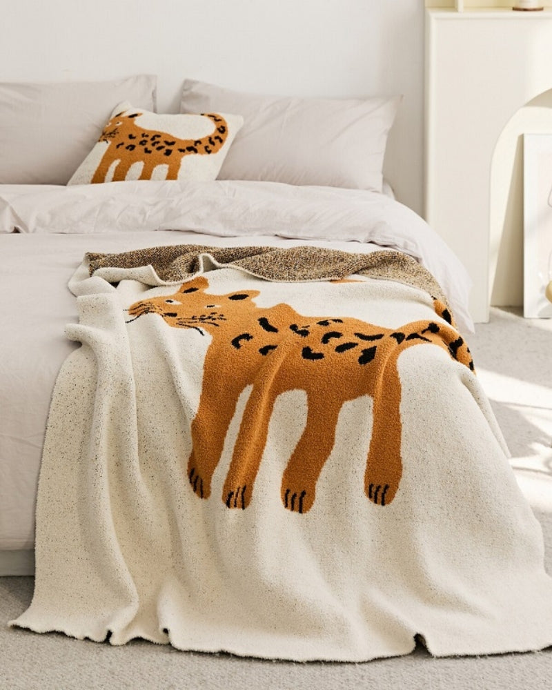 Vue d'ensemble du plaid beige avec motif chat enfantin