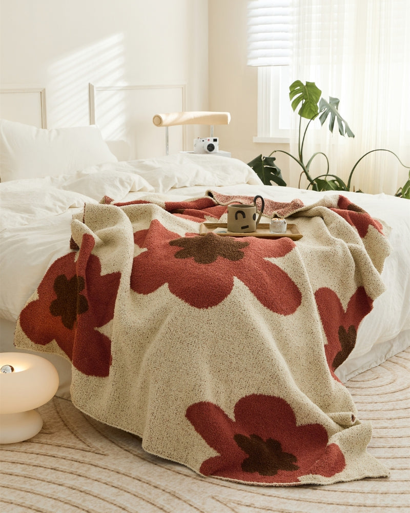 Vue d'ensemble du plaid doudou sur un fauteuil