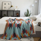 Gros plan sur les motifs rouges et oranges du plaid
