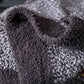 Plaid marron enroulé, prêt à être utilisé
