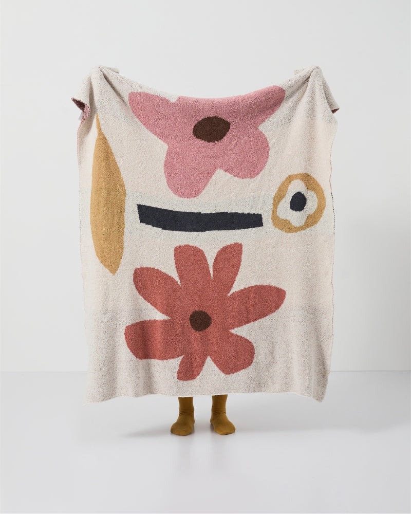 Vue d'ensemble du plaid crème avec motifs de fleurs
