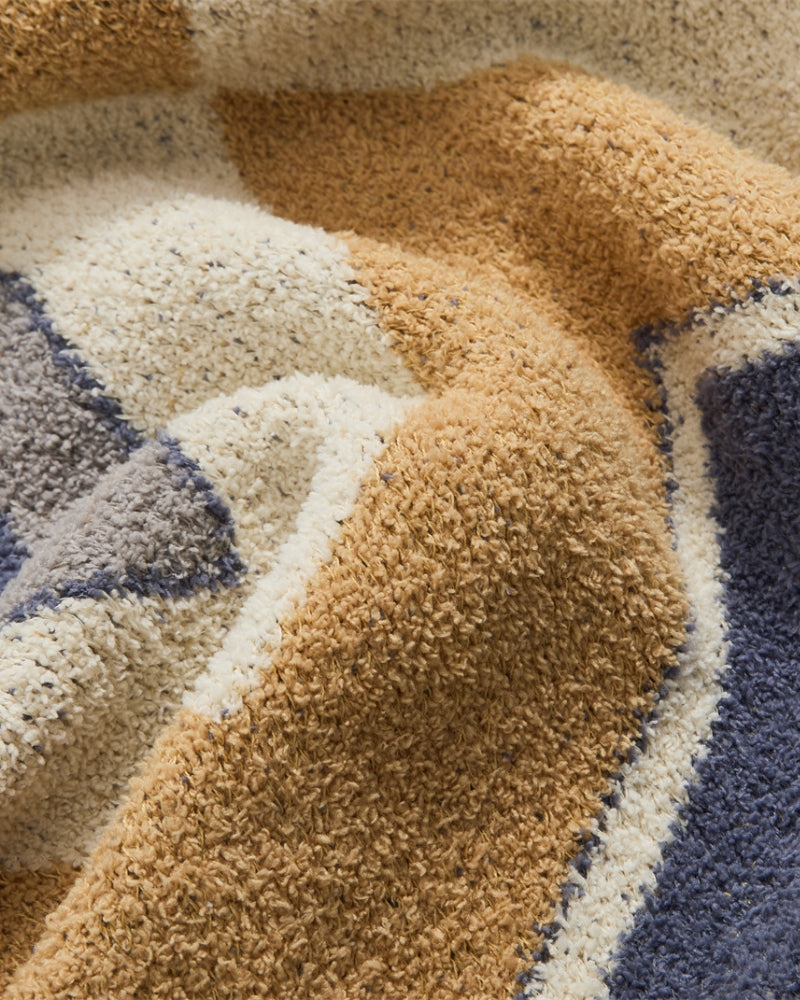 Texture douce du plaid polaire en gros plan