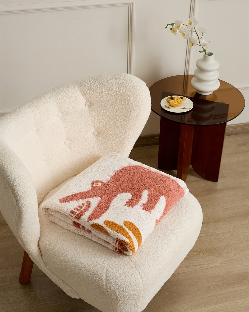 Plaid polaire rose avec motif central crème