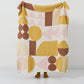Texture du plaid en sherpa avec motifs roses et jaunes