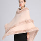 Détail du tissu pilou du poncho rose pastel