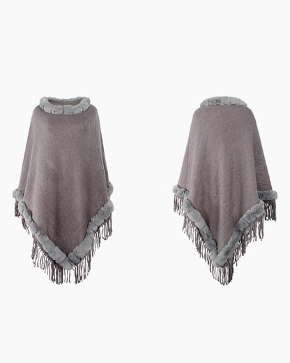 Poncho ample porté avec jean et bottines