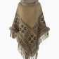 Vue arrière du poncho montrant les motifs et le col