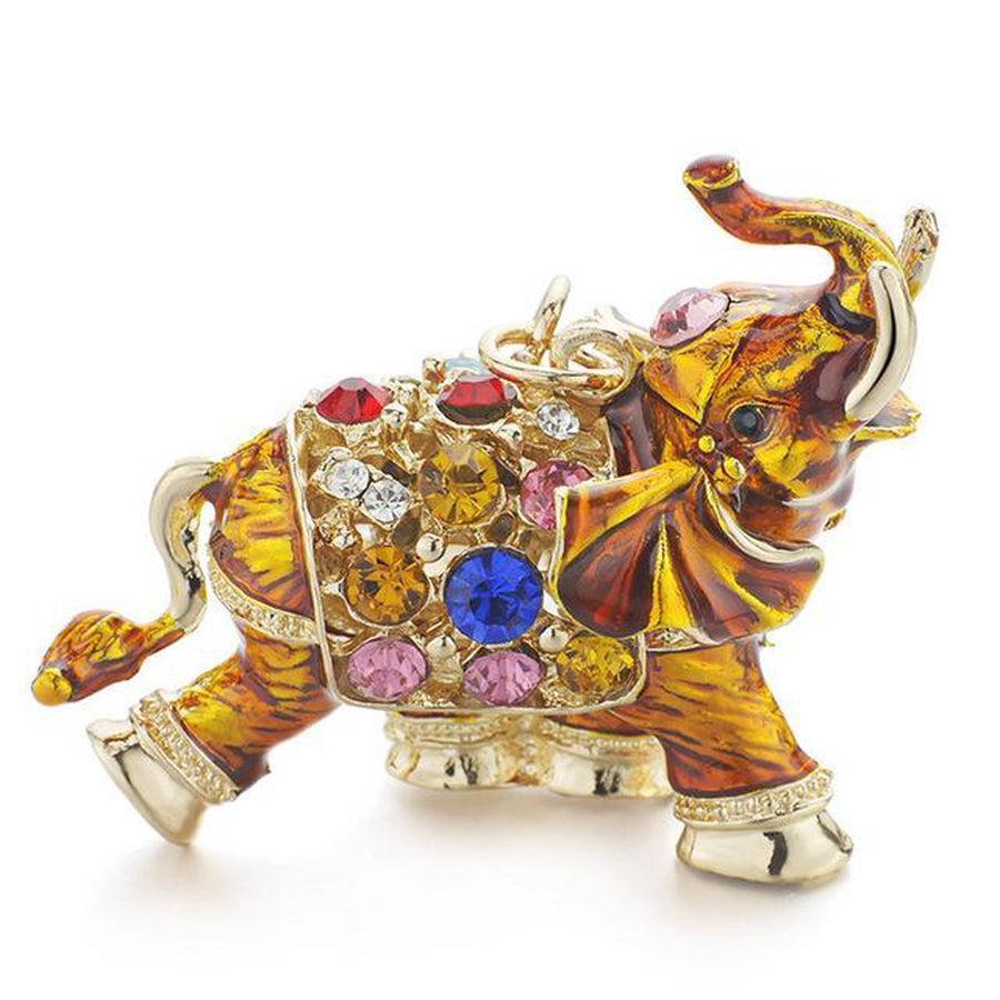 Porte-clés éléphant avec trompe levée, symbolisant la chance